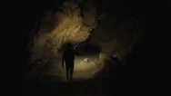 Cave Explorer Searching For A Way Out Stock Footage
