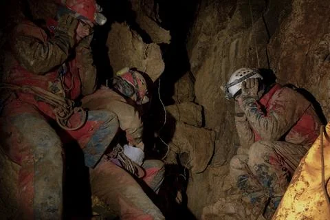 Cave explorers Stock Photos