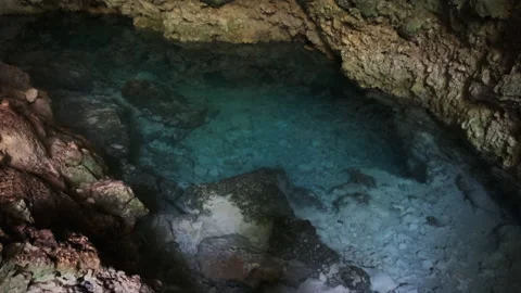Cave with Fresh Water, Underground River Cave Under the Cliffs, Zanzibar, Kuza Stock Footage 152702192