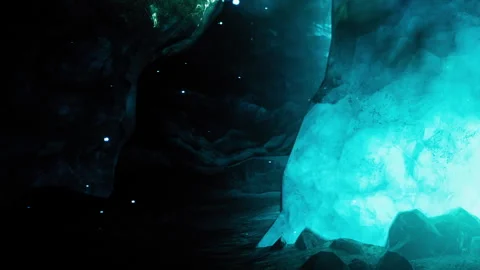 Cave with glowing crystals and dark surroundings at night Stock Footage 344128648
