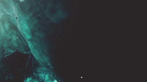 Cave with glowing elements and dark surroundings at night Stock Footage 342800904