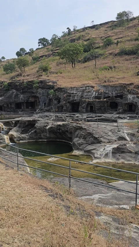 Cave hillside and stream, India Vertical 4K Video stock 348263258