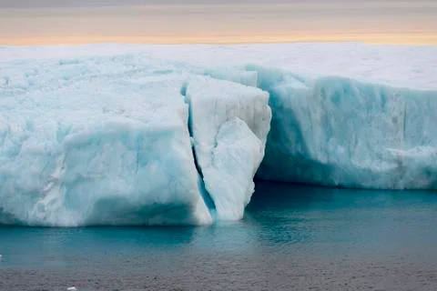 Cave in an iceberg Stock Photos