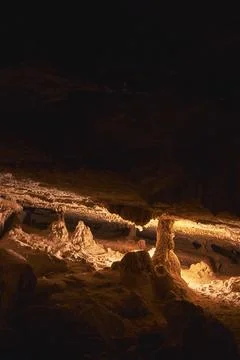 Cave Interior Rock Formations with Dramatic Light Painting in Cowboy Canyon.. Stock Photos