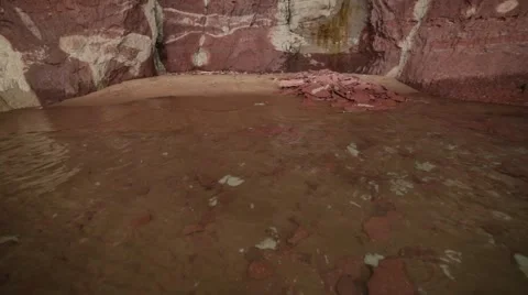 Cave on lakeshore tilt Stock Footage 46064244