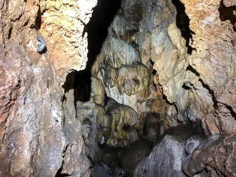 A cave in the mountains Stock Photos
