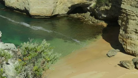 Cave Next to Blue Waters Stock Footage 303020625