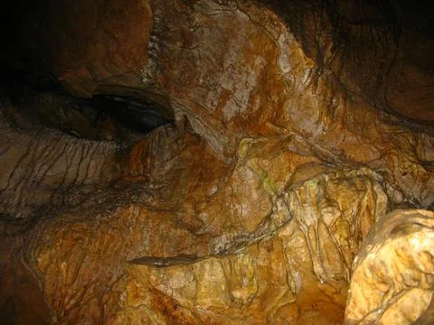 Cave passages deep underground, the texture of the cave walls Stock Photos