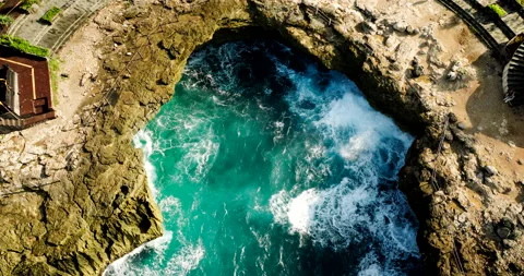 Cave Pool On The Edge Of Rocky Cliffs On Devil's Tears In Nusa Lembongan, Stock Footage 276559460