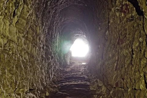 Cave in the rock, towards the exit Stock Photos