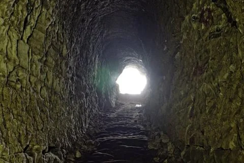 Cave in the rock, towards the exit Stock Photos