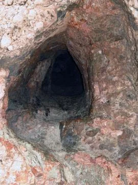 Cave on the slope Stock Photos