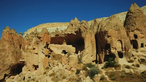 Cave town and rock structures in Zelve Valley, Cappadocia, Turkey Stock Footage 99726522