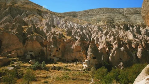 Cave town and rock structures in Zelve Valley, Cappadocia, Turkey Stock Footage 99726527