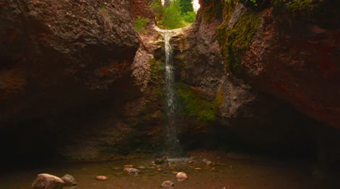 Cave waterfall 4K Video stock 33711073