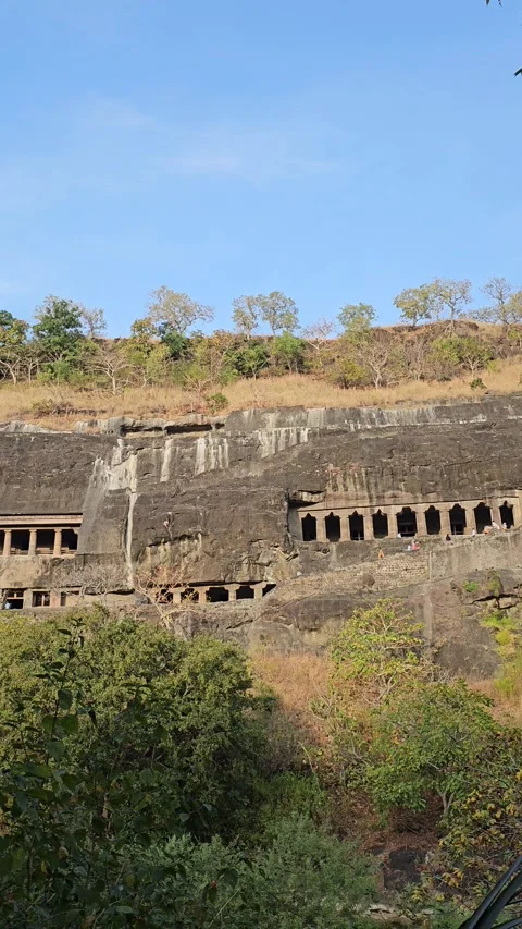 Cave Windows In Sunlit Basalt Cliff Face, Ajanta Caves, Maharashtra, India Stock-Footage 256913196