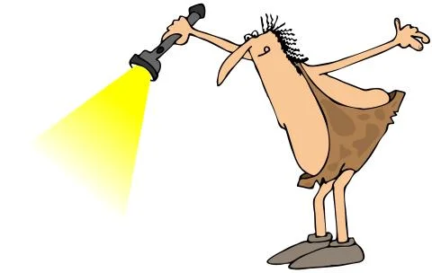 Caveman shining a flashlight Stock Illustration