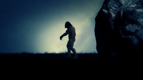 A Caveman Stepping Out of His Cave Stock Footage 103597123