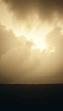 Cavernous clouds hovering above tranquil landscape at sunset Stock Illustration