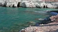 Caves on rocky shore, settlements of Pejia, Pathos city, Cyprus HD Footage