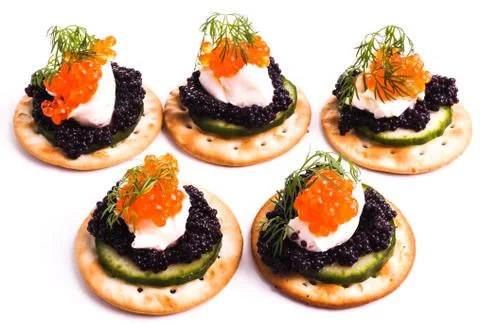 Caviar Appetizer served on crackers Stock Photos