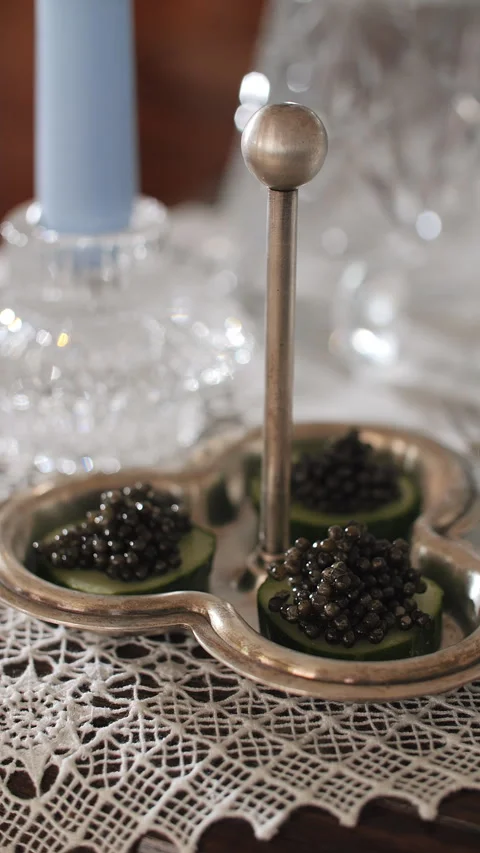 Caviar Appetizer on Silver Tray with Lace Tablecloth Video stock 321306438