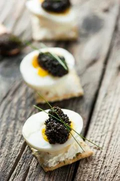 Caviar, egg and crispy bread Stock Photos