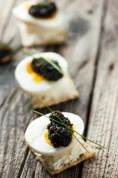 Caviar, egg and crispy bread Stock Photos