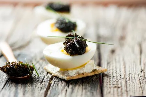 Caviar, egg and crispy bread Stock Photos