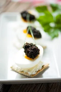 Caviar, egg and crispy bread Stock Photos