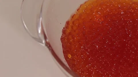 Caviar in a transparent container Stock Footage 68710620