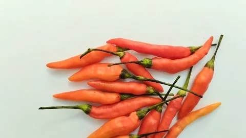 Cayenne pepper (cabe rawit) on a white background 스톡 동영상 310291327
