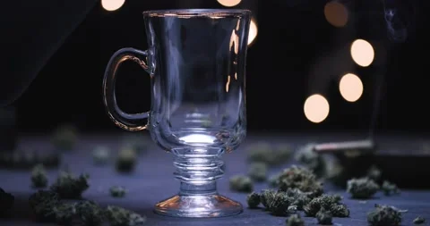 CBD Tea Pour Into Glas Mug 4k 120p Stock Footage 229010117