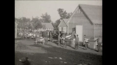 CCC WS carry beds into building 1936 Stock Footage 56160562