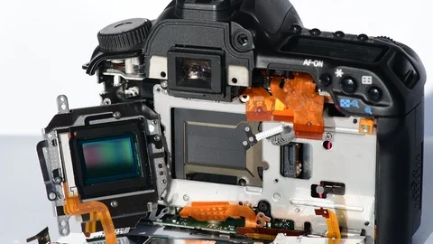 Ccd sensor and digital slr camera showing shutter mechanism Stock Footage 123459135