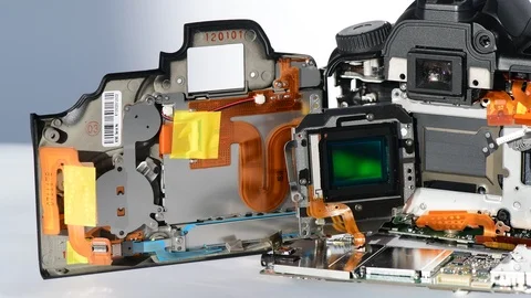 Ccd sensor and digital slr camera showing shutter mechanism Stock Footage 123459443