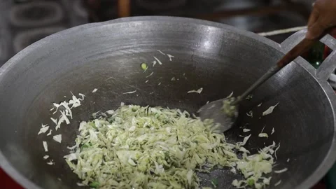 CChef Hands Stir Frying Shredded White Cabbage Vegetables Stock Footage 346443364