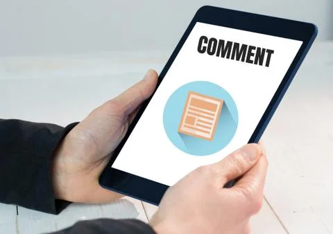 CComment text and graphic on tablet screen with hands 스톡 사진