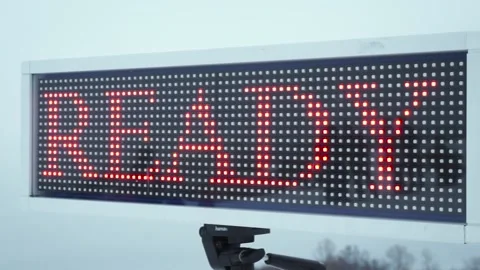 CCose up shot pixel screen of "get ready" text. Footage. Racing scoreboard on Stock Footage 131029700