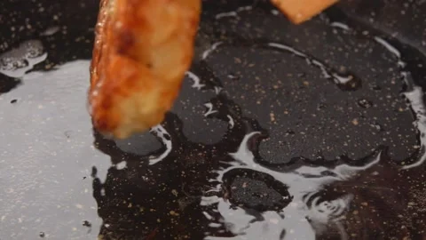 CCose-up spatulas turn over a potato pancake with a golden crust Stock Footage 232954548