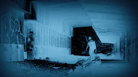 CCTV Anonymous Man Walks Beneath Overpass Video stock 278186245