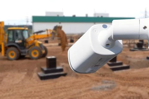 CCTV with Blurring Building construction background. Stock Photos