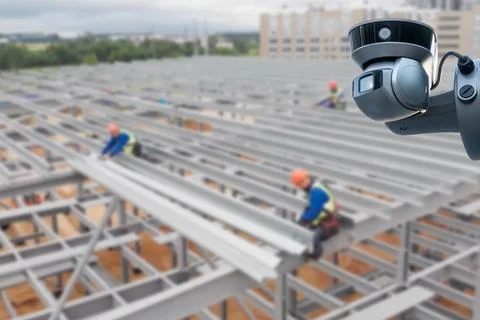 CCTV with Blurring Building construction background. Stock Photos