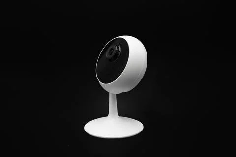 CCTV camera with angle lens with night vision on black background Stock Photos