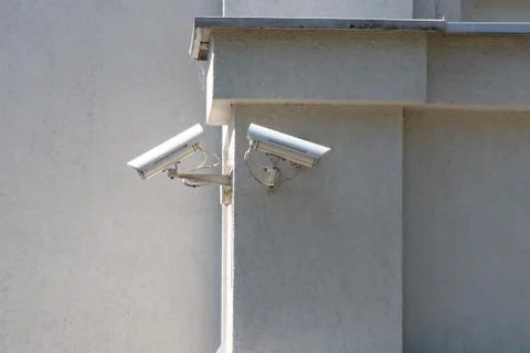 CCTV camera attached on the wall of the building, monitoring and tracking, monit 스톡 사진