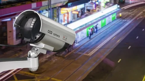 CCTV camera. With the backdrop tail lights blurred on the road timelapse 스톡 동영상 82959606