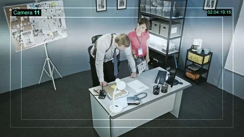 CCTV camera captures the work of policemen and policewoman on police station Video stock 71004285