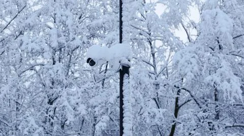 CCTV Camera Covered with Snow Close-up on the Right Stock Photos