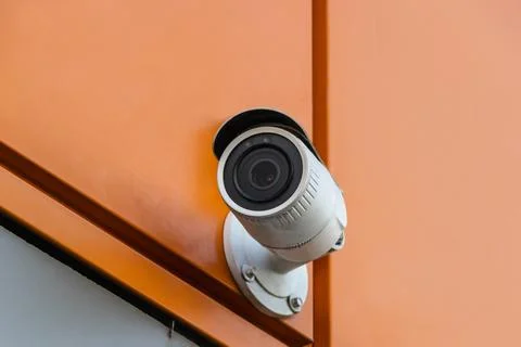 CCTV camera on the facade of the house. Camera for security Stock Photos