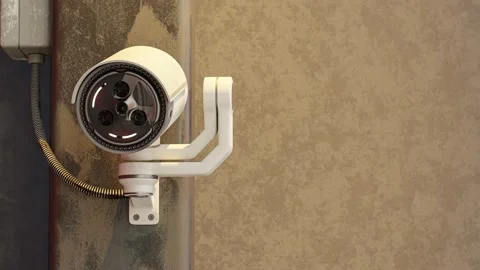 CCTV camera fixed on metal pole on cement wall background.  Vídeo Stock 227728791